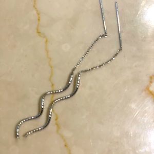 White gold pull through earrings.